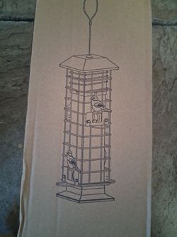 Green Squirrel proof bird feeder