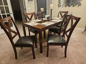 New beautiful dining set... 6 chairs and table