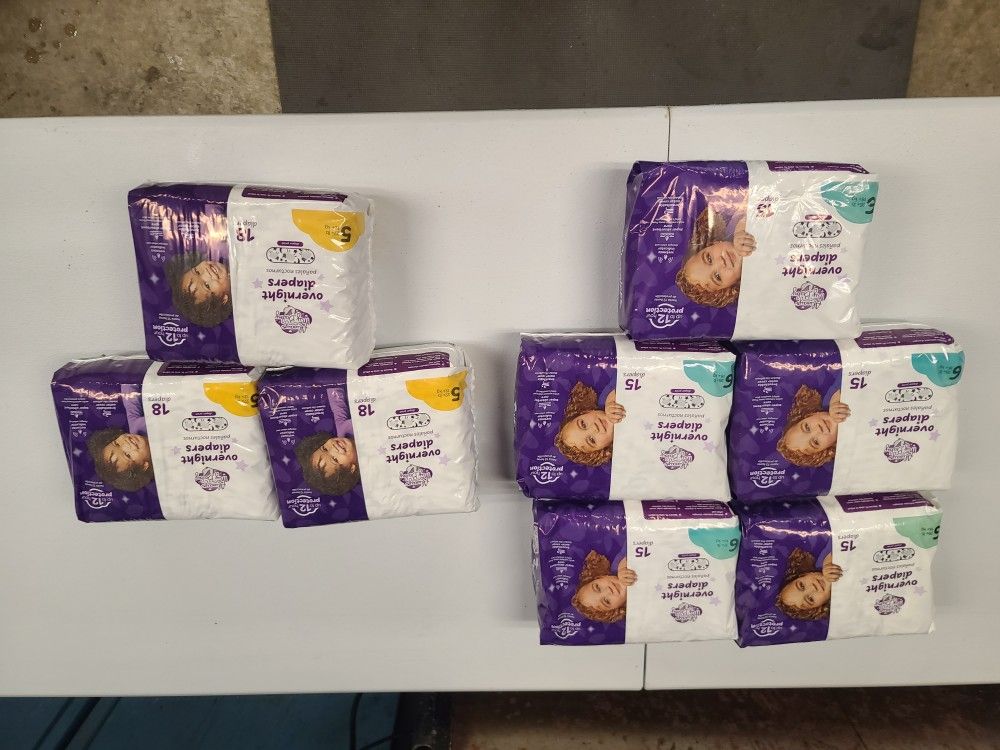 8  New Packs of Diapers - Sizes 5 & 6 - Cheap!