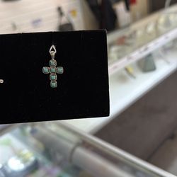 Small turquoise cross