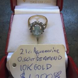 Ladies ring 2.1 ct aquamarine .5 ct diamonds 10k gold ring size 5.5