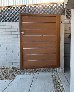 Custom Metal Gates, Fencing, Powder Coated Frame, Trex Wood Finish