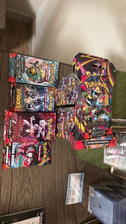 Pokemon Destined Rivals (x7), Surging Sparks (x3), Pitch Black (x5) and Pitch Black Boosters (x2), Journey Together (x3)