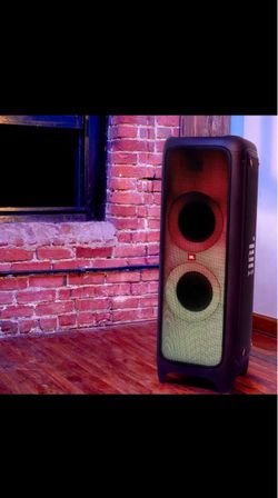 JBL PartyBox 1000 - High Power Wireless Bluetooth Party Speaker comes with an included Air Gesture Wristband