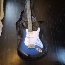 Rock Jam Stratocaster Electric Guitar And Amplifier 