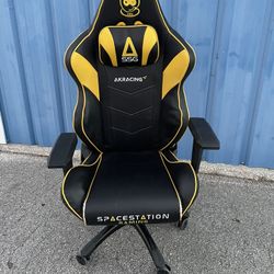 Gaming or Computer Chair -( size: 27”x 24”x 12”in high up to seat )- Used good/fair condition 