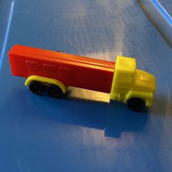 Vintage PEZ Dispenser.  No Feet Semi Truck Red&Yellow From Slovenia