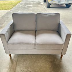 Gray Love seat In Decent Condition