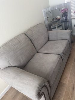Gray Fabric Loveseat with Nailhead Trim