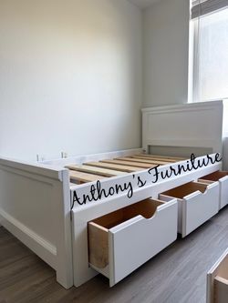 White twin bed with drawers