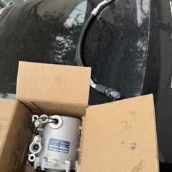 A/C Compressor And Discharge Hose