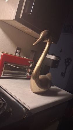 Vintage brass swans