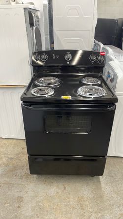 GE electric stove 4 coils in color black