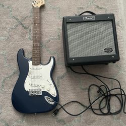 Fender Electric Guitar And Speaker