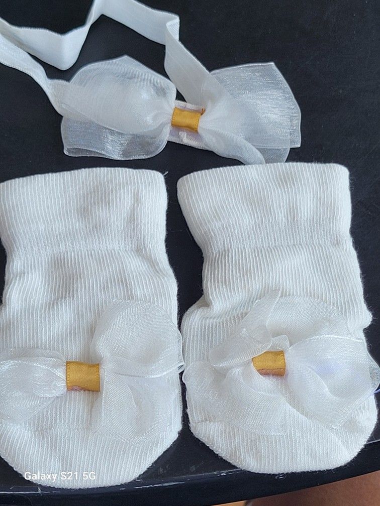 baby white booties and headband