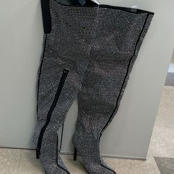 Size 7 1/2..Black thigh high boots with rhinestones. Worn Only Once. 