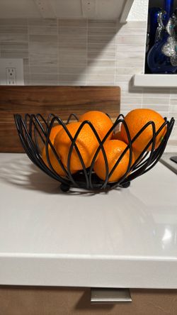 Black metal fruit bowl