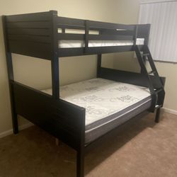  Twin/full bunk bed. Tax included. Free local delivery. $350 for bunk bed only. $550 with mattresses. Available in espresso and white  Assembly requir