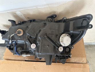 Factory Headlights Driver and Passenger side.