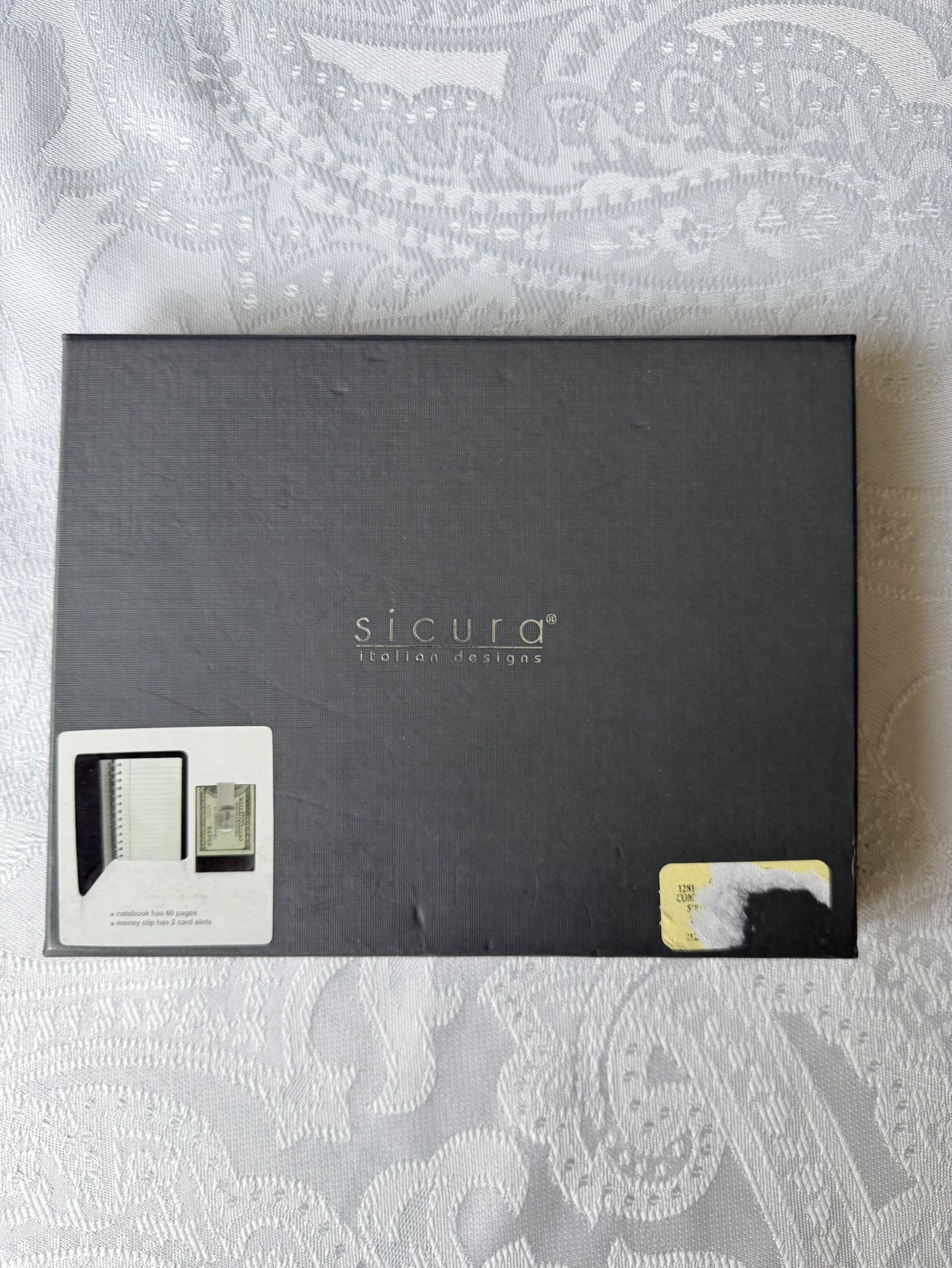 Money Clip with Notebook set from the brand "Sicura Italian Designs". Stylish and functional accessory, made from high-quality leather. The set includ