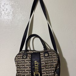 Juicy Couture black and beige handbag with repeating 'Juicy Couture' text 