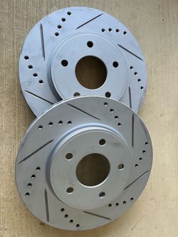 Nissan NV200 13-21 Front Drill Slot Geomet Rotors Ceramic Brake Pads