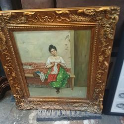 vintage or antique oil painting of a woman sitting on a bench sewing,