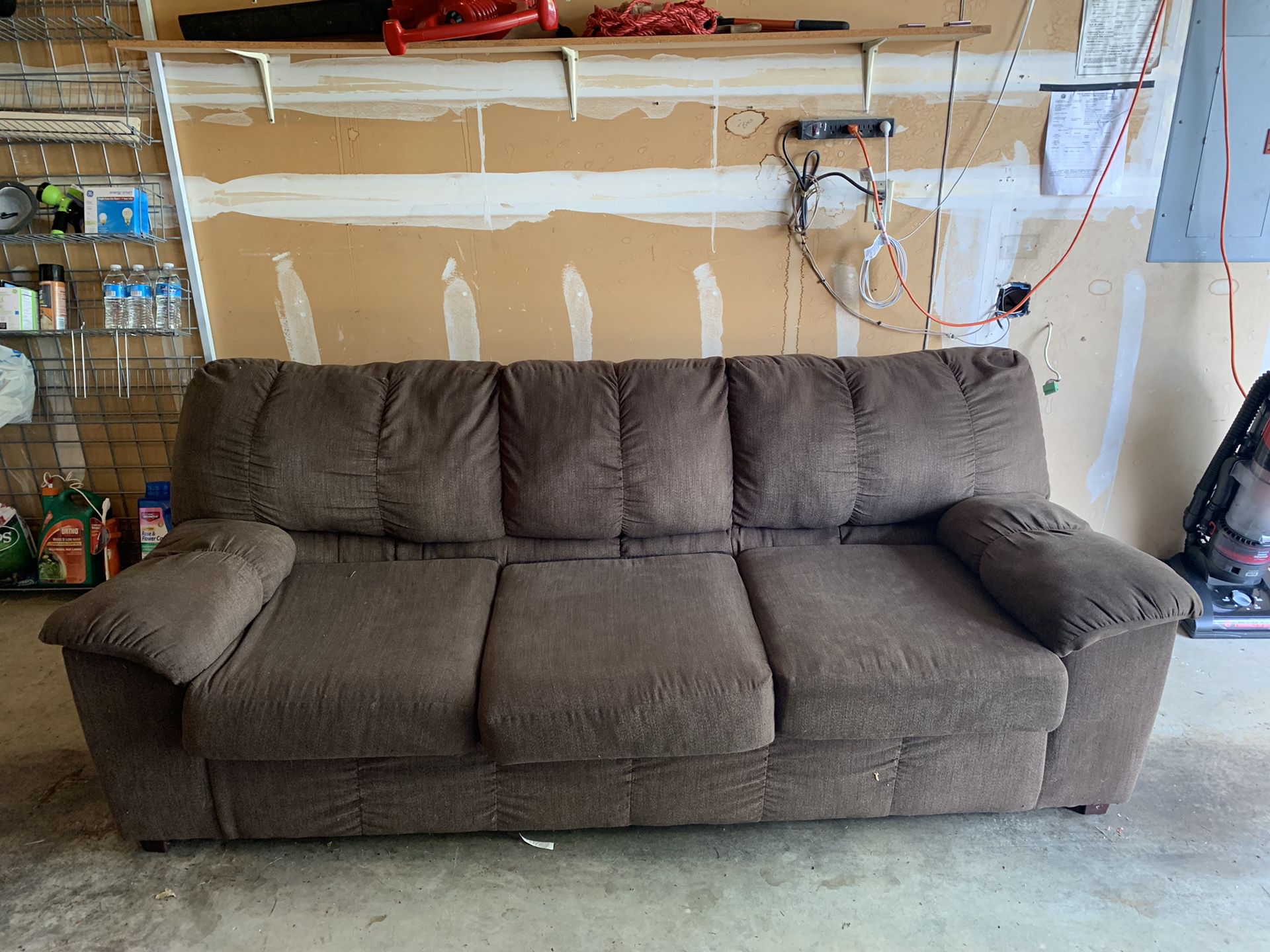 Brown Couch in fair condition. It needs cleaning