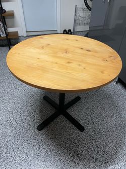 Round Wood Table with Black Pedestal Base