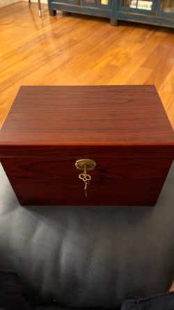 Vintage Royal Salute 21 Years Old Scotch Whisky wooden presentation box featuring a blue velvet interior lining and a gold-toned key lock.