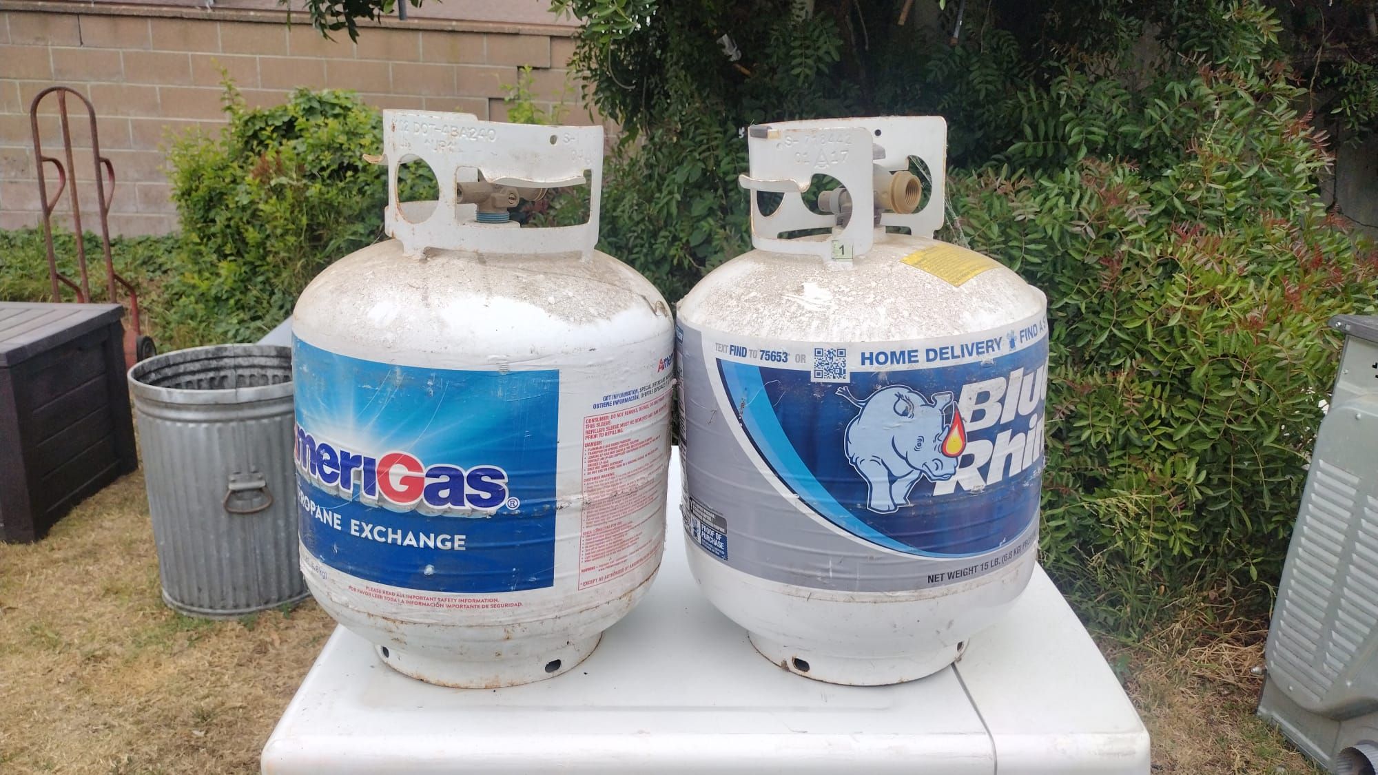2 empty propane tanks