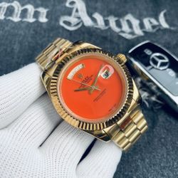 Orange Dial Dual Calendar Watch