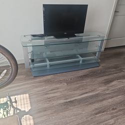 Glass and metal Entertainment center with flat screen tv mount