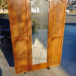 Antique Mirrored Armoire