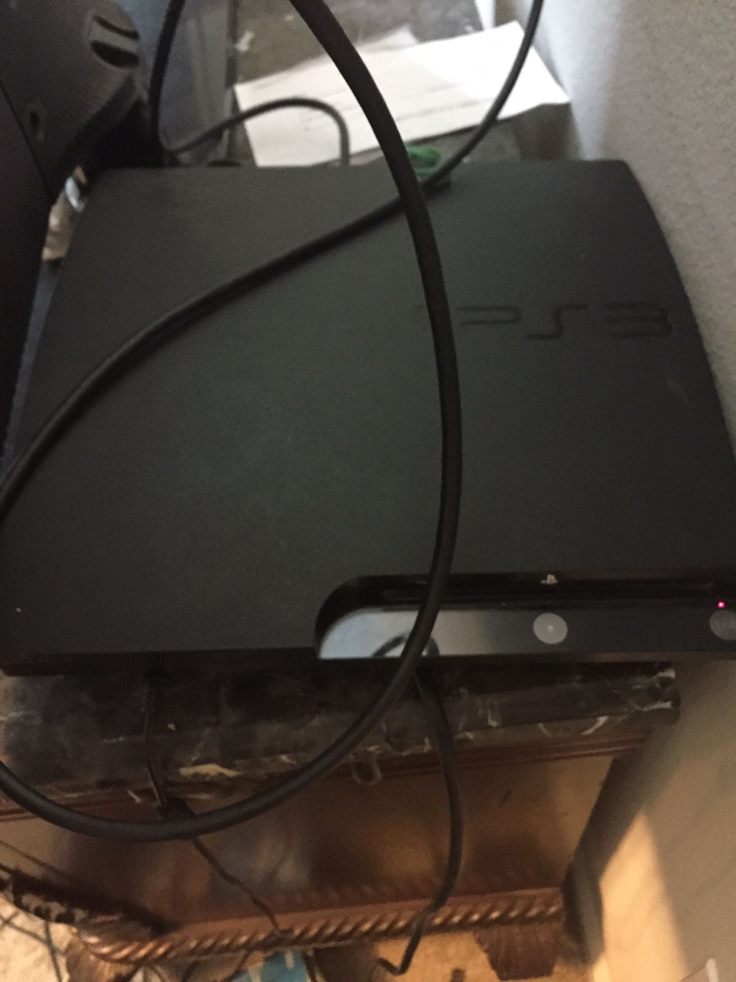 PS3 with over 20+ games and 2 controllers