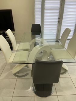 Glass dinning table & 6 Chairs