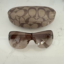 Authentic Coach sunglasses with a case