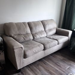 Cream/Tan colored Sofa Couch