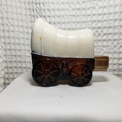 Vintage Avon Covered Wagon Glass Decanter Wild Country BOTTLE (EMPTY) . Good condition . Decanter measures 3 3/4" T X 4 3/4" L