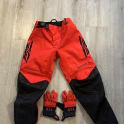 Dirt bike Fly racing pants size 24 and gloves and knee pads