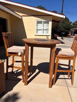 High top table with two chairs