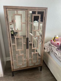 Mirrored Wood Cabinet with Geometric Door design