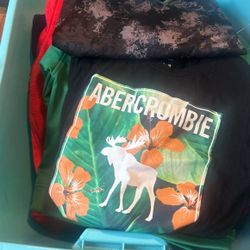 A Tote of kids New & Used Clothes , shoes 