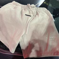 brand new essentials shorts just got the tag stain
