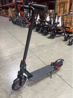 Front and rear shock-absorbing electric scooters