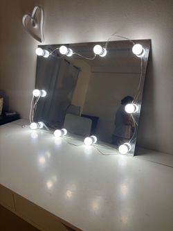Vanity mirror with lights. No desk