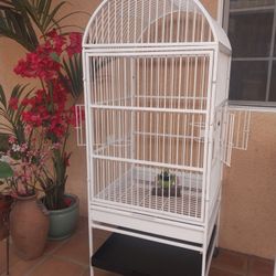 LARGE HEAVY DUTY PARROT CAGE HAS BEING SANDED AND REPAINTED IS IN EXCELLENT CONDITION 
