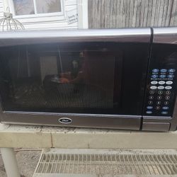 Prices Firm.. Microwave Oven