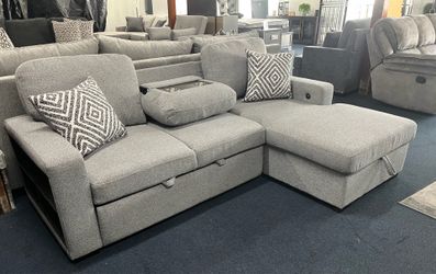 Light grey sleeper sectional w/ storage