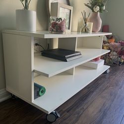 White TV stand on Wheels